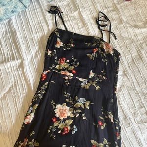 A medium sized, see through, dark blue coloured dress.